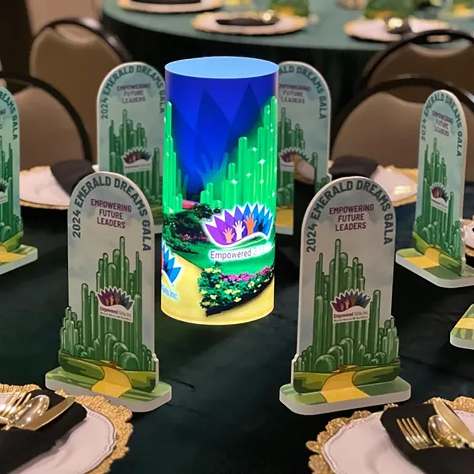 LED illuminated centerpieces in a hotel ballroom for a corporate event