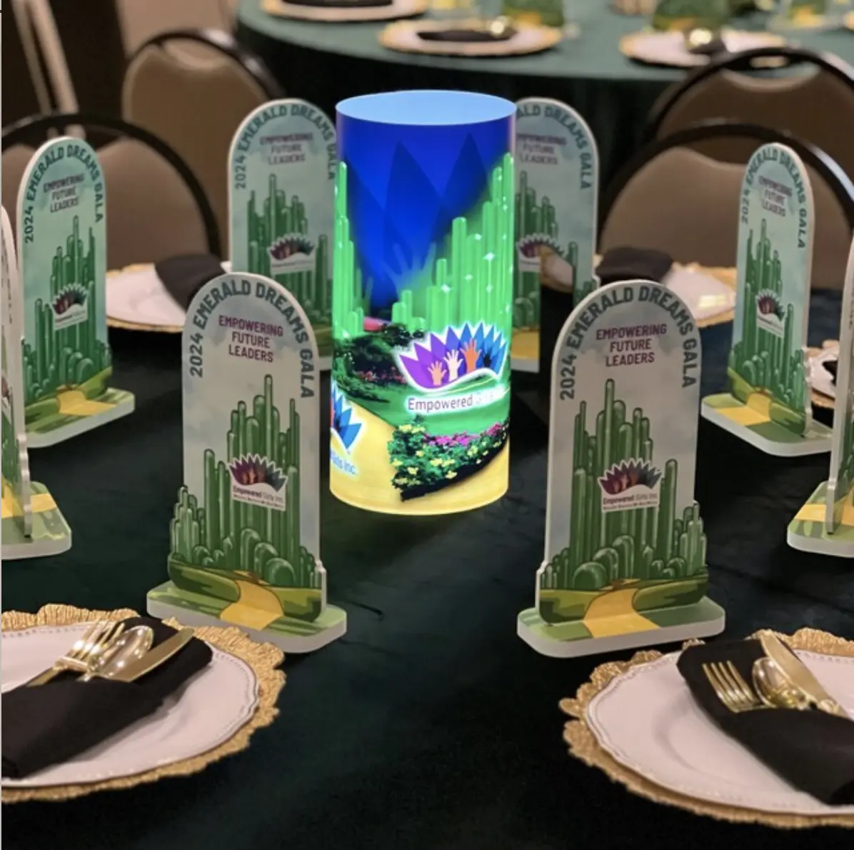 A destination celebration design printed on a colorful illuminated centerpiece