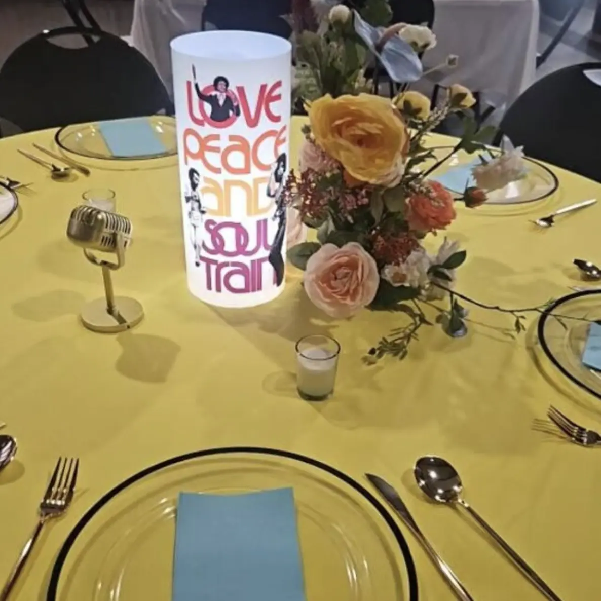 A bright illuminated centerpiece carrying a message of love and peace