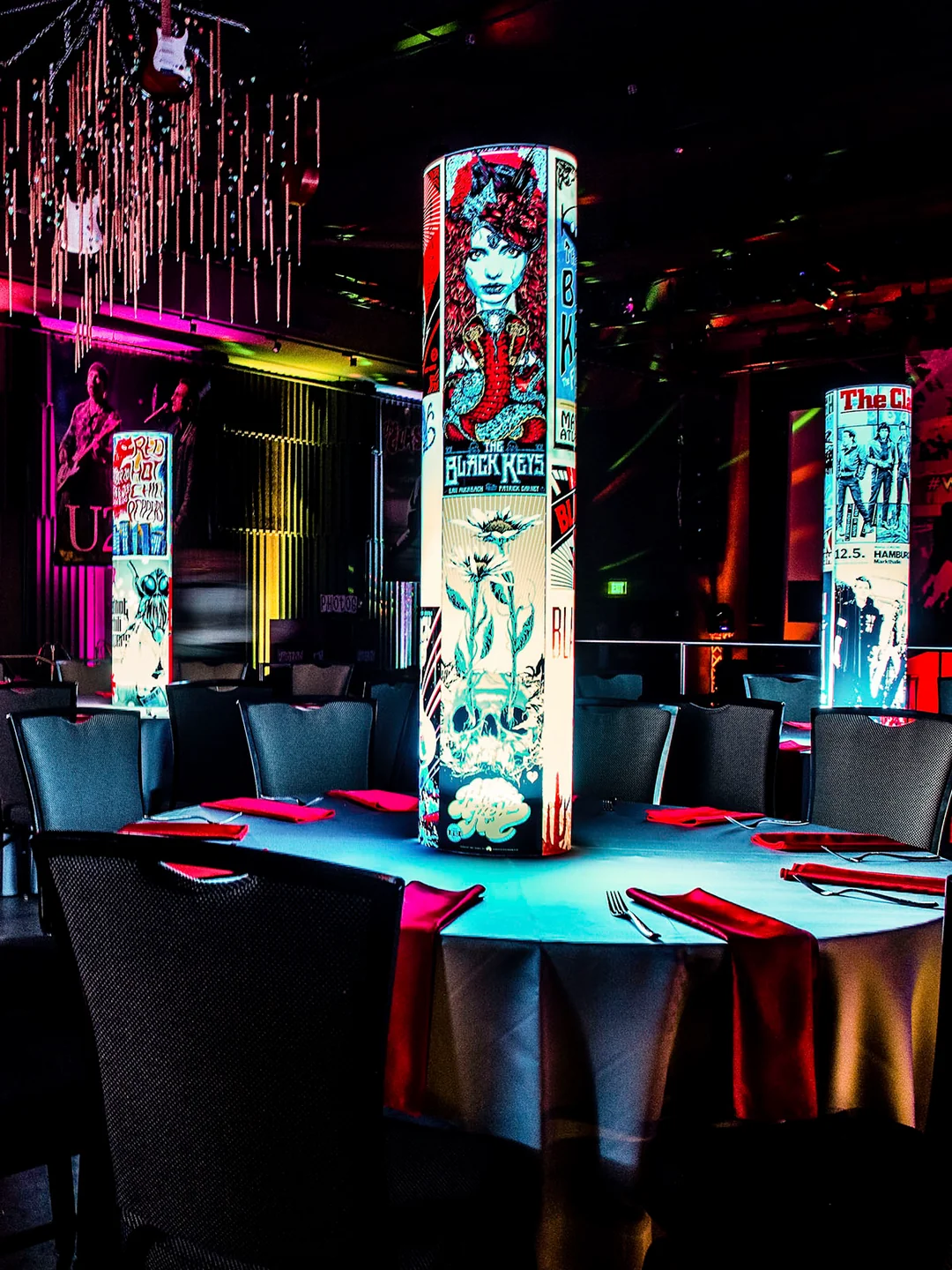 Tall music themed illuminated centerpiece at a celebration